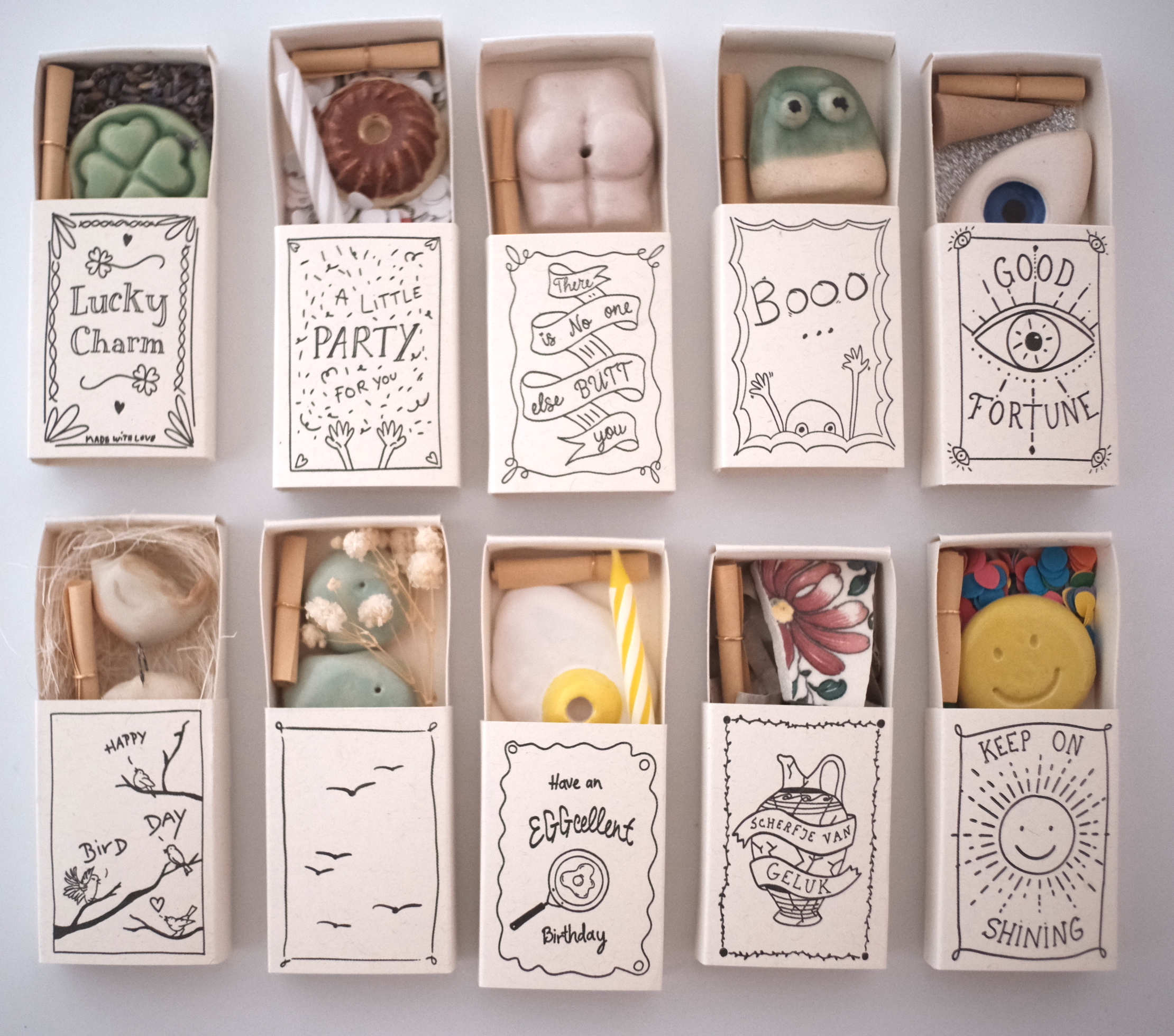 Many Studio Gentle matchboxes together